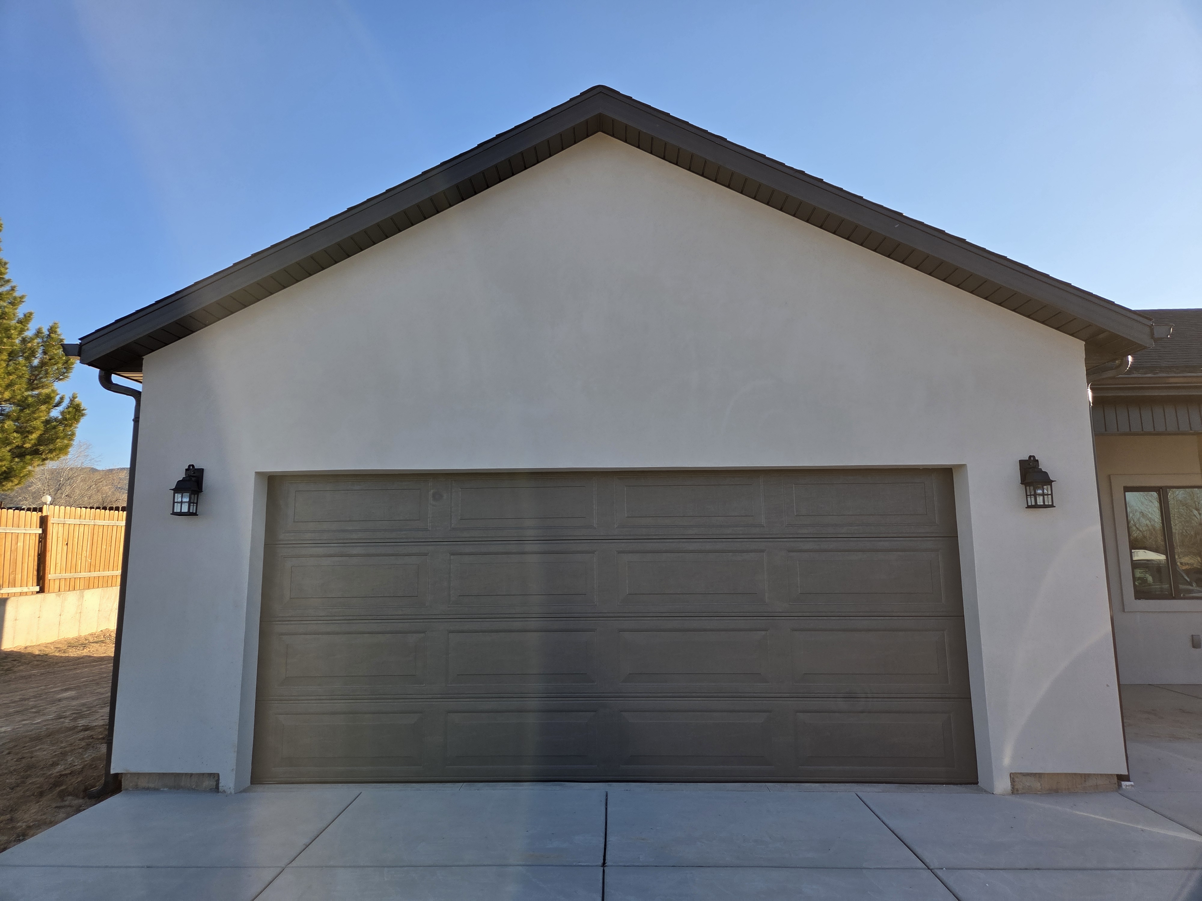 Newly installed garage door on a modern Southern Utah home