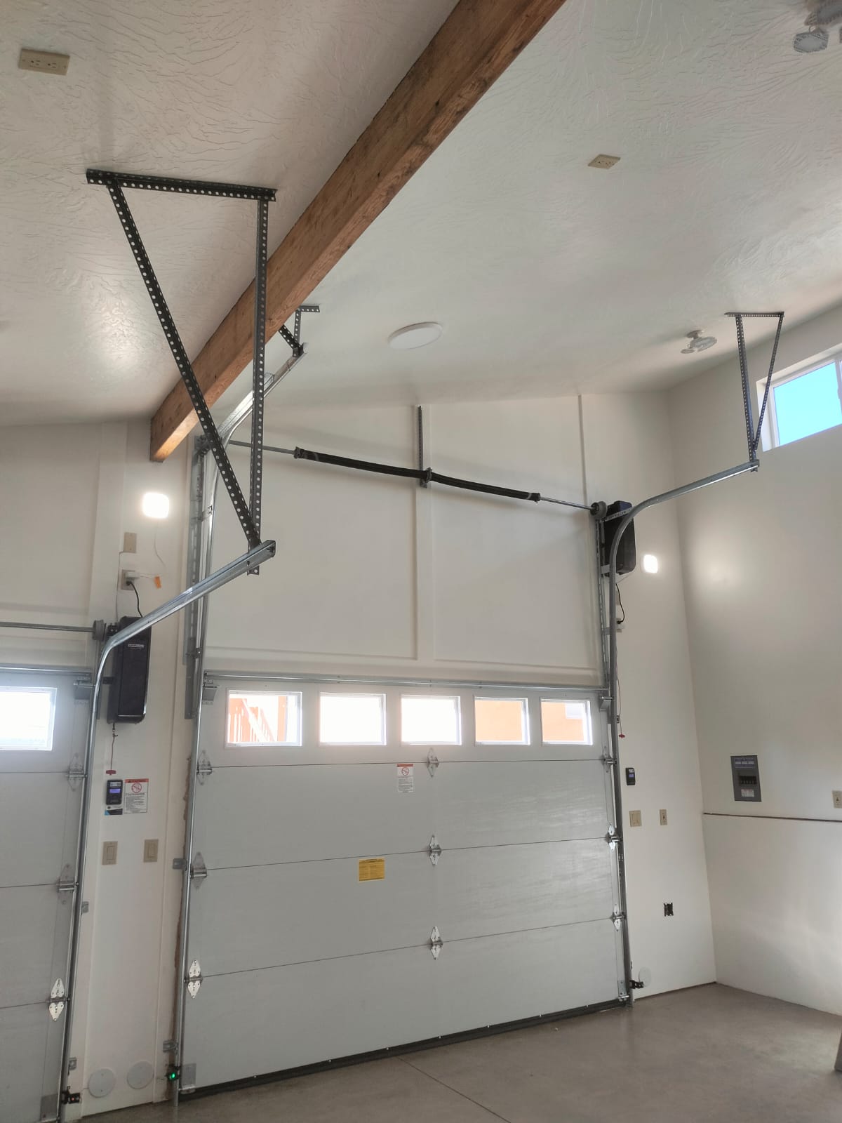 Garage door track and hardware installation in progress