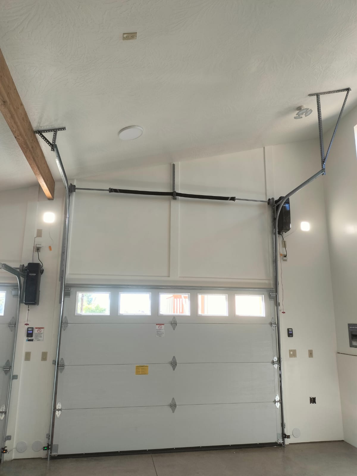 Garage door opener and track installation in progress